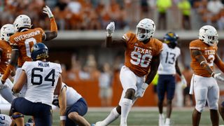 The Steelers Return To An Impenetrable Run Defense Might Be Just A Texas 2-Step Away With Moro Ojomo  (Steelers Draft News). Photo by Tim Warner / Getty Images